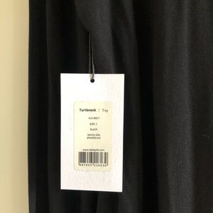 Bailey 44 Tops - NWT BAILEY 44 turtleneck body suit. Bailey 44 Tops - NWT BAILEY 44 turtleneck body suit.